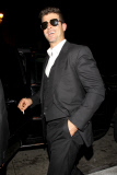 Robin Thicke celebrates Halloween with some pretty ladies at the Los Angeles Theater **NO Australia, New Zealand**