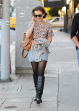 Lily Collins Walks Down Sunset Blvd with a Friend