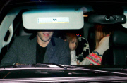 Sacha Baron Cohen and Isla Fisher at LAX with the girls