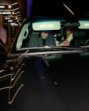 Sacha Baron Cohen and Isla Fisher at LAX with the girls