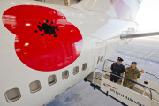 To commemorate the contribution of British and Commonwealth servicemen and women in the two world wars and later conflicts, a British Airways 747 has been adorned with a giant poppy