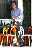 *EXCLUSIVE* A dapper Kiefer Sutherland dines out solo in WeHo