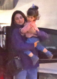 EXC: PENELOPE CRUZ AT HEATHROW AIRPORT