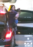 EXC: PENELOPE CRUZ AT HEATHROW AIRPORT