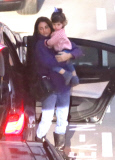 EXC: PENELOPE CRUZ AT HEATHROW AIRPORT