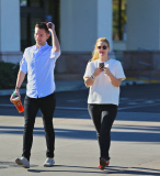 A Tired Looking Drew Grabs Morning Coffee with a Friend at Starbucks