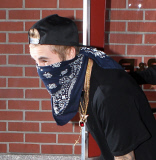 Justin Bieber covers up with bandana after Forbes honor