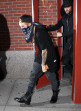 Justin Bieber covers up with bandana after Forbes honor
