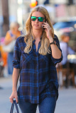 Nicky Hilton makes a happy call following a doctors visit