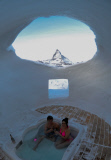 Check in, chill out! Stunning igloo hotel opens with private pools, mountain saunas and candle-lit suites ... but no running water
