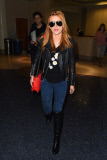 Bella Thorne rocks Ray-Bans for her late night arrival at LAX **NO UK**