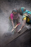 women labor working in dusty environment