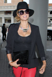 Paris Hilton dressed to the 9's for air-travel