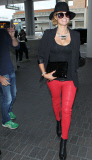 Paris Hilton dressed to the 9's for air-travel