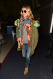 Heidi Klum shows off her monkey business at LAX **NO UK**