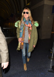 Heidi Klum shows off her monkey business at LAX **NO UK**