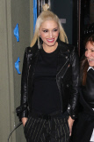 Gwen Stefani and Gavin Rossdale can't contain the smiles after a holiday dinner party