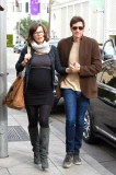 Pregnant Milla Jovovich carefully makes her way to lunch with Paul W. S. Anderson