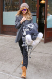 Suki Waterhouse keeps her slim frame under wraps