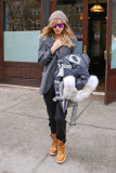 Suki Waterhouse keeps her slim frame under wraps