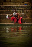 Pilgrims bathe and wash in the holy waters of the Ganges, Varanasi, India