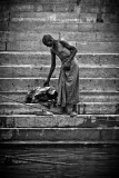 Pilgrims bathe and wash in the holy waters of the Ganges, Varanasi, India