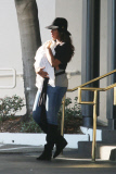 Kelly Rowland carries Titan out of Saks Fifth Ave 
