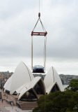 Ford Mustang car lifted onto rooftop, Sydney, Australia - 28 Dec 2014