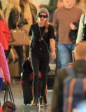 Emma Roberts by herself at LAX
