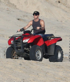Exclusive... Justin Theroux & John Krasinski Ride ATV'S On The Beach In Cabo 
