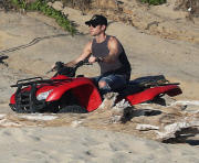 Exclusive... Justin Theroux & John Krasinski Ride ATV'S On The Beach In Cabo 