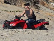 Exclusive... Justin Theroux & John Krasinski Ride ATV'S On The Beach In Cabo 
