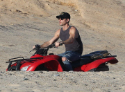 Exclusive... Justin Theroux & John Krasinski Ride ATV'S On The Beach In Cabo 