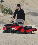 Exclusive... Justin Theroux & John Krasinski Ride ATV'S On The Beach In Cabo 