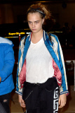 *EXCLUSIVE* Cara Delevingne looking tired arriving at LAX **NO UK**