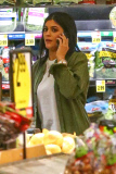 *EXCLUSIVE* Kylie Jenner grocery shops in daisy dukes, Louboutin¿s and a trench coat