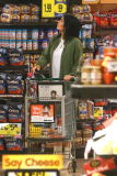 *EXCLUSIVE* Kylie Jenner grocery shops in daisy dukes, Louboutin¿s and a trench coat