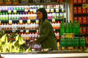 *EXCLUSIVE* Kylie Jenner grocery shops in daisy dukes, Louboutin¿s and a trench coat