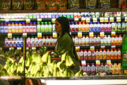 *EXCLUSIVE* Kylie Jenner grocery shops in daisy dukes, Louboutin¿s and a trench coat