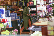 *EXCLUSIVE* Kylie Jenner grocery shops in daisy dukes, Louboutin¿s and a trench coat