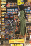*EXCLUSIVE* Kylie Jenner grocery shops in daisy dukes, Louboutin¿s and a trench coat