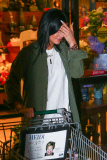 *EXCLUSIVE* Kylie Jenner grocery shops in daisy dukes, Louboutin¿s and a trench coat