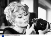 ANITA EKBERG AND RIK VAN NUTTER.   1965
