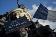 Hundreds of thousands of people fill the streets of Paris