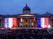 London landmarks pay tribute to victims of the terror attacks in France.