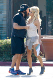 Pamela Anderson locks lips with her on-again, off-again husband Rick Salomon