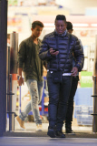Jermaine Jackson takes a call while out with his boys