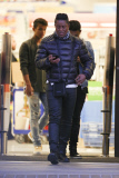 Jermaine Jackson takes a call while out with his boys