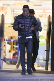 Jermaine Jackson takes a call while out with his boys