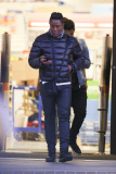 Jermaine Jackson takes a call while out with his boys